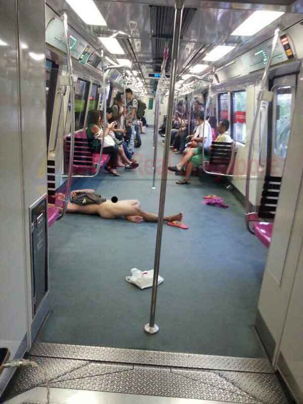 Singapore Strips Naked Man on MRT Train Arrested Talk Cock Sing Song