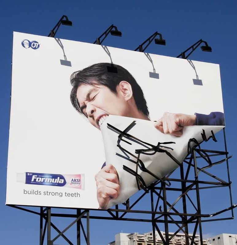 Formula Toothpaste Builds Strong Teeth Billboard Ad Talk Cock Sing Song
