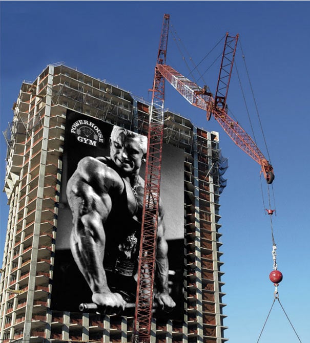 Powerhouse Gym Man Lifting Billboard Ad Talk Cock Sing Song